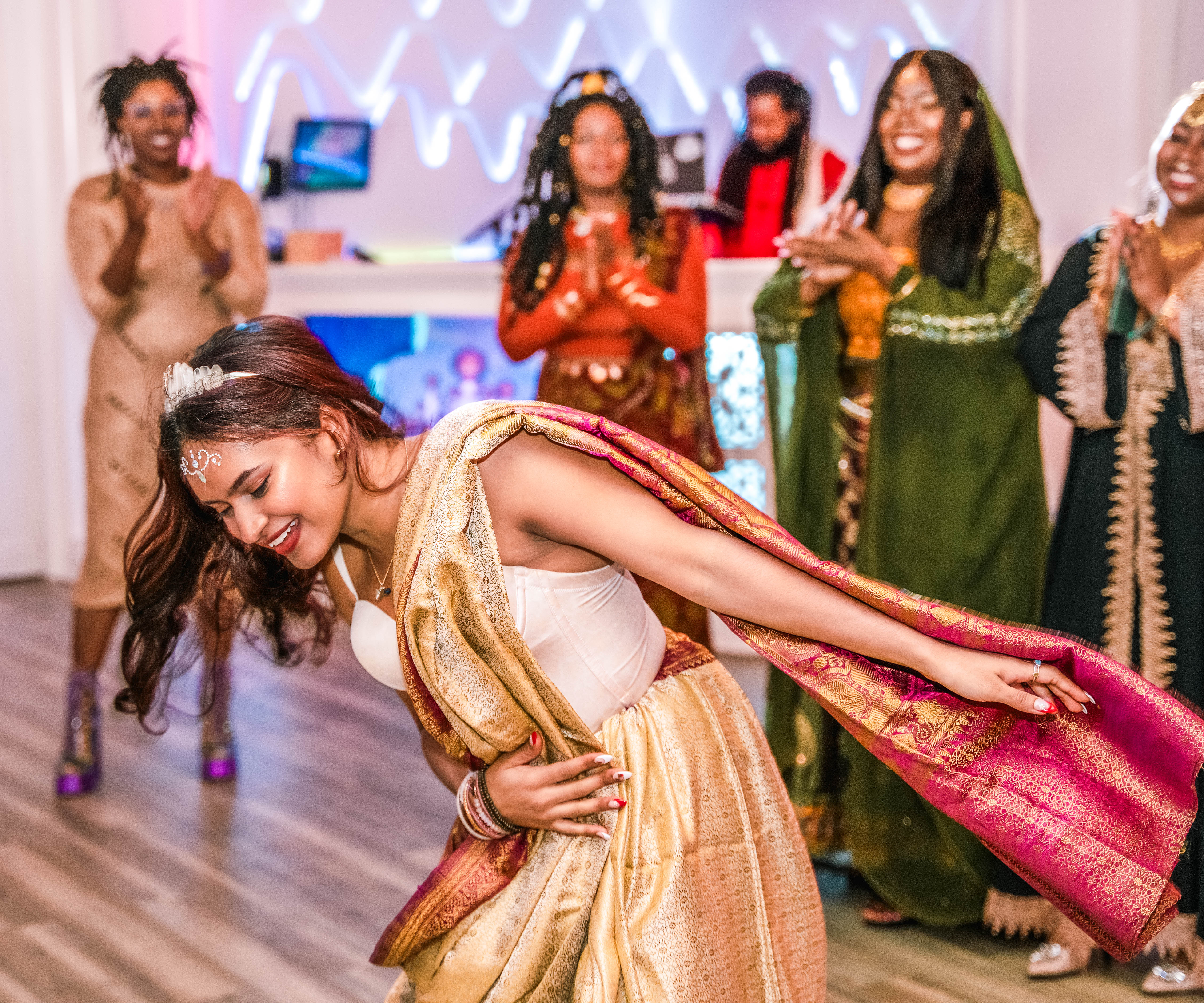 Guests enjoying themselves on the dance floor at Aladdin themed wedding in Orlando, FL.