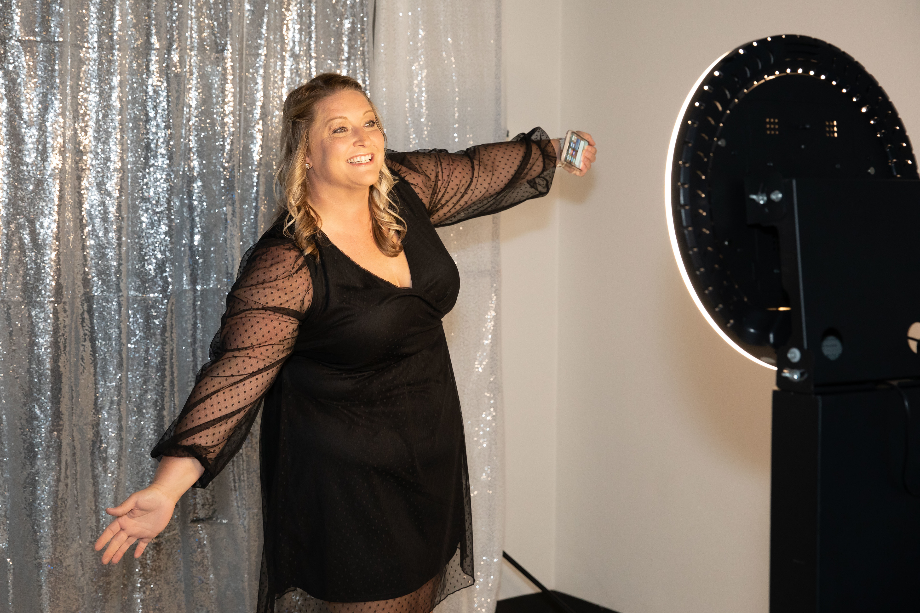 Guest smiling for the Social Photo Booth at Lake Mirror in Lakeland, FL
