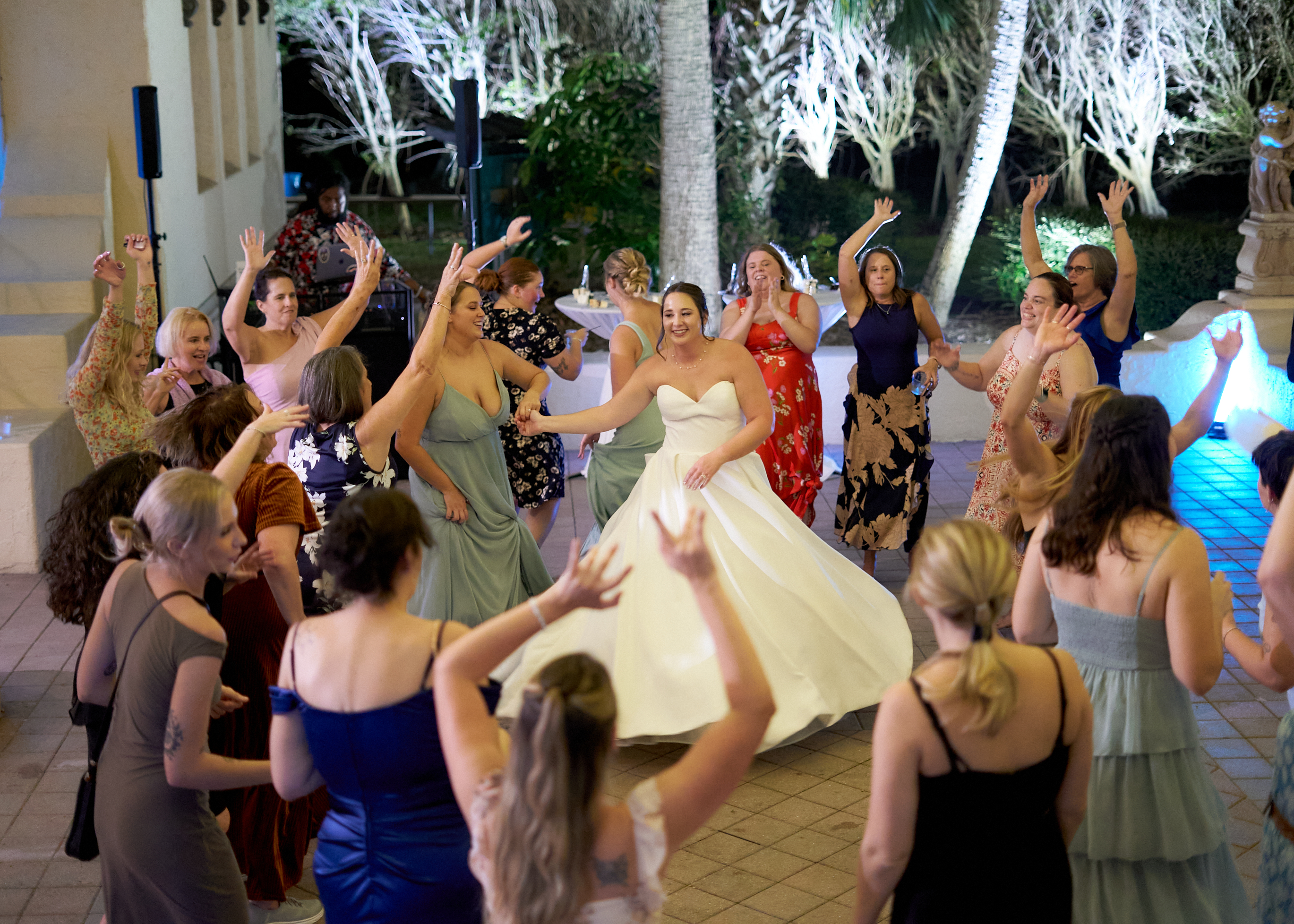 Wedding reception with DJ Bush Entertainment in Central Florida with guests dancing and celebrating