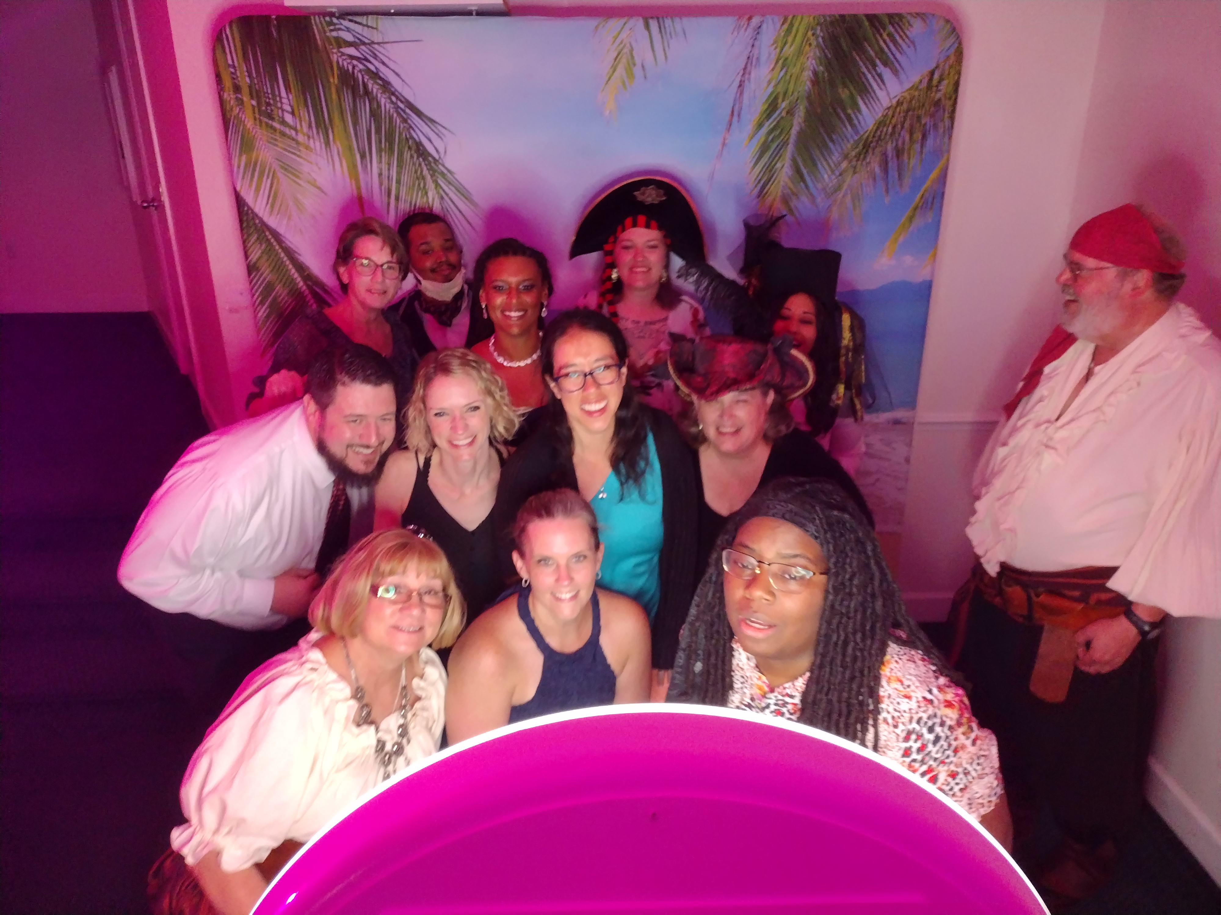 A group of lawyers enjoying the social photo booth at the Public Defender's Pirate Ball in Lakeland,FL